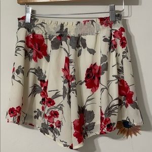 white/red floral shorts with expandable waistband